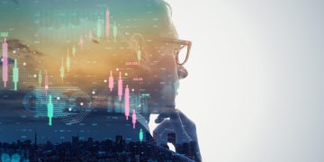 La silueta de un hombre con la mano en la barbillla.